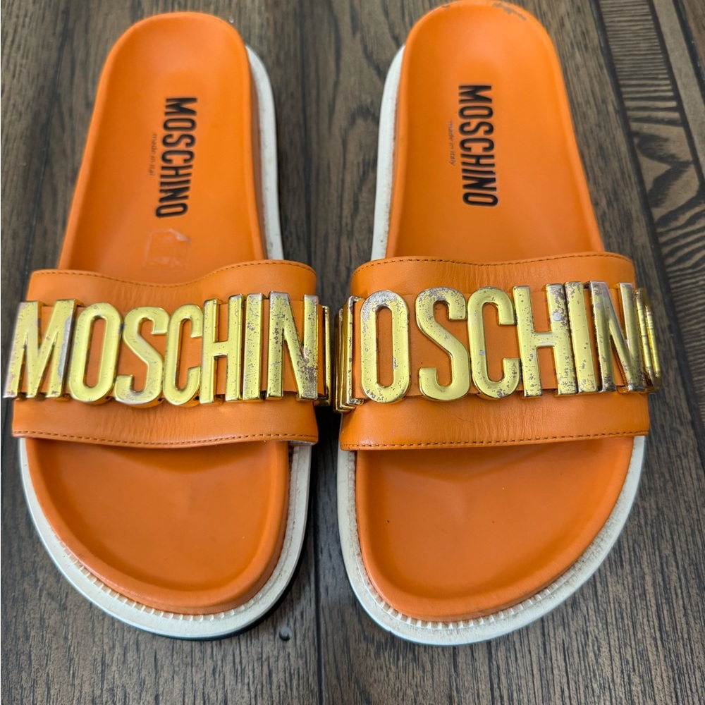 Moschino Orange Slides with Gold Lettering
